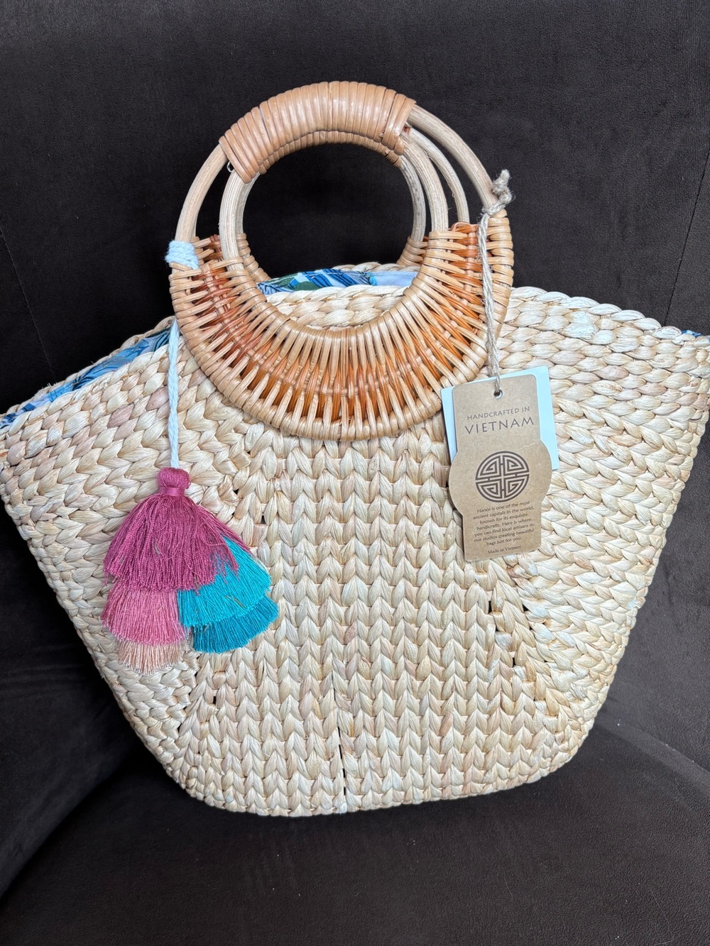 Handwoven Straw Tote with Pink & Blue Tassel Accent